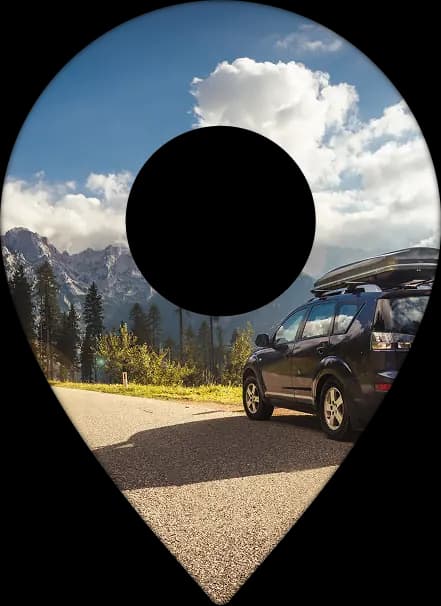 Znak lokalizacji z autem